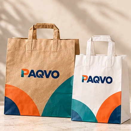 Branded kraft and white paper carrier bags with handles